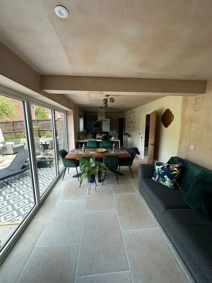 Finished kitchen diner with bi fold doors to the garden