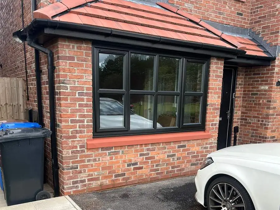 Integral garage with the door replaced by a black window